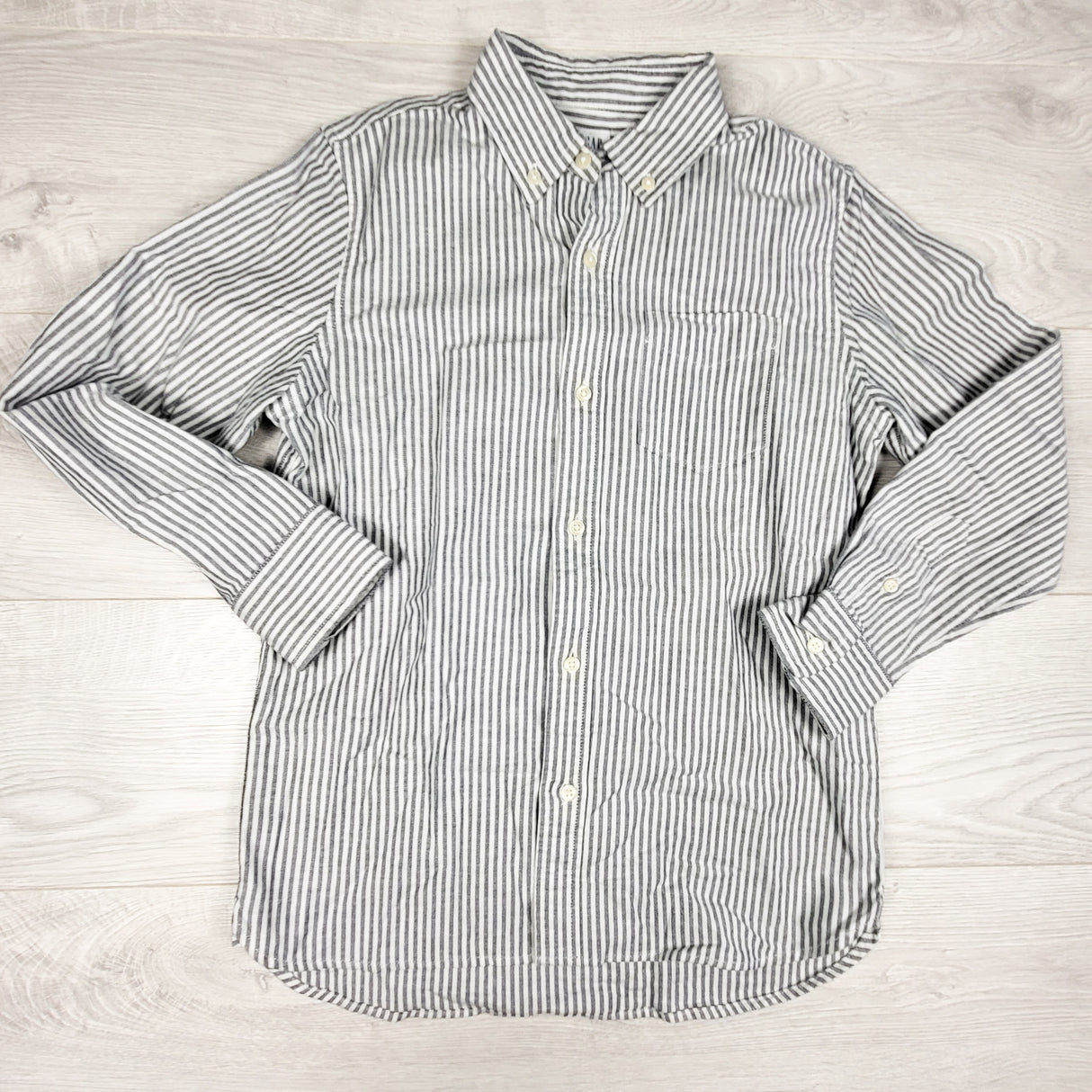 Gap white and blue pin striped button down shirt. Size 10