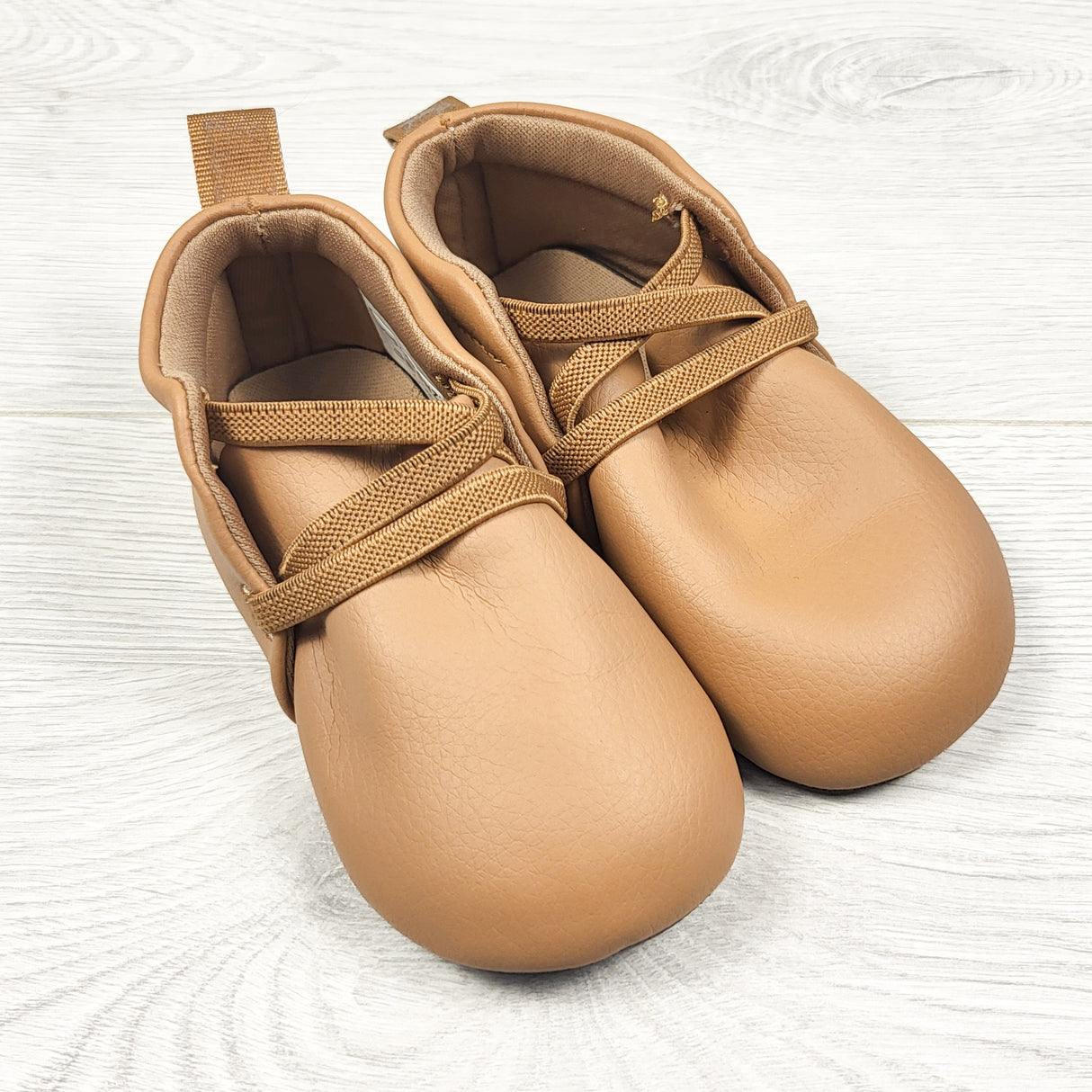 Stonz camel coloured soft soled shoes. Size 18-24 months