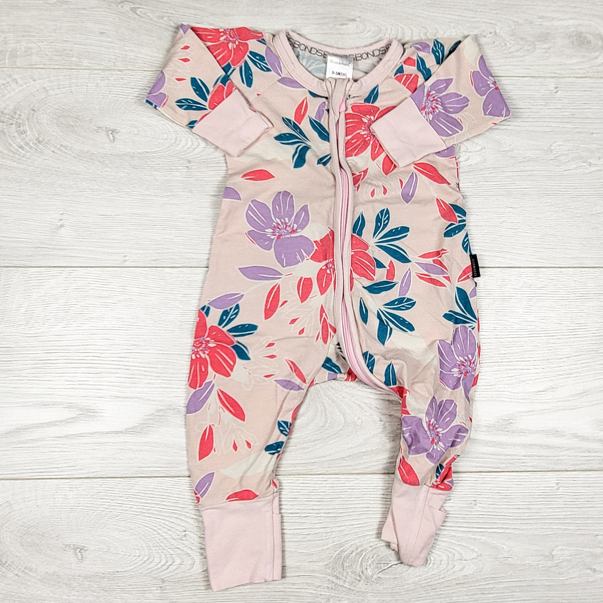 Bonds pink floral print wondersuit. Size 0-3 months