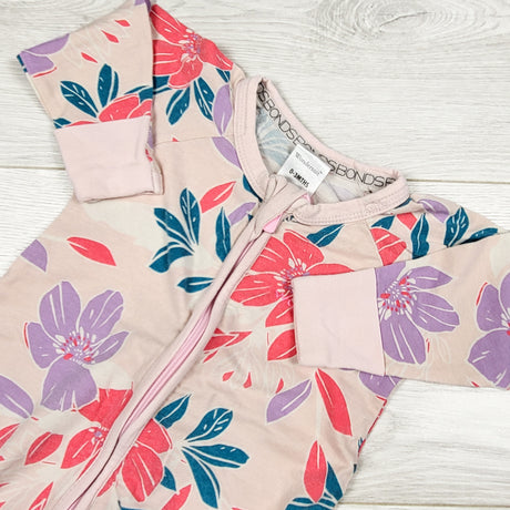 Bonds pink floral print wondersuit. Size 0-3 months