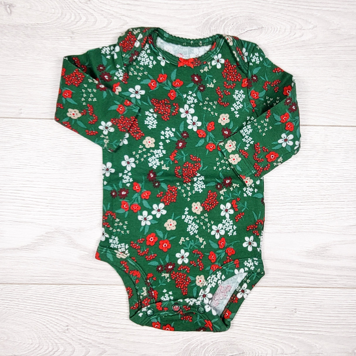 Carters green floral print bodysuit. Size 3 months