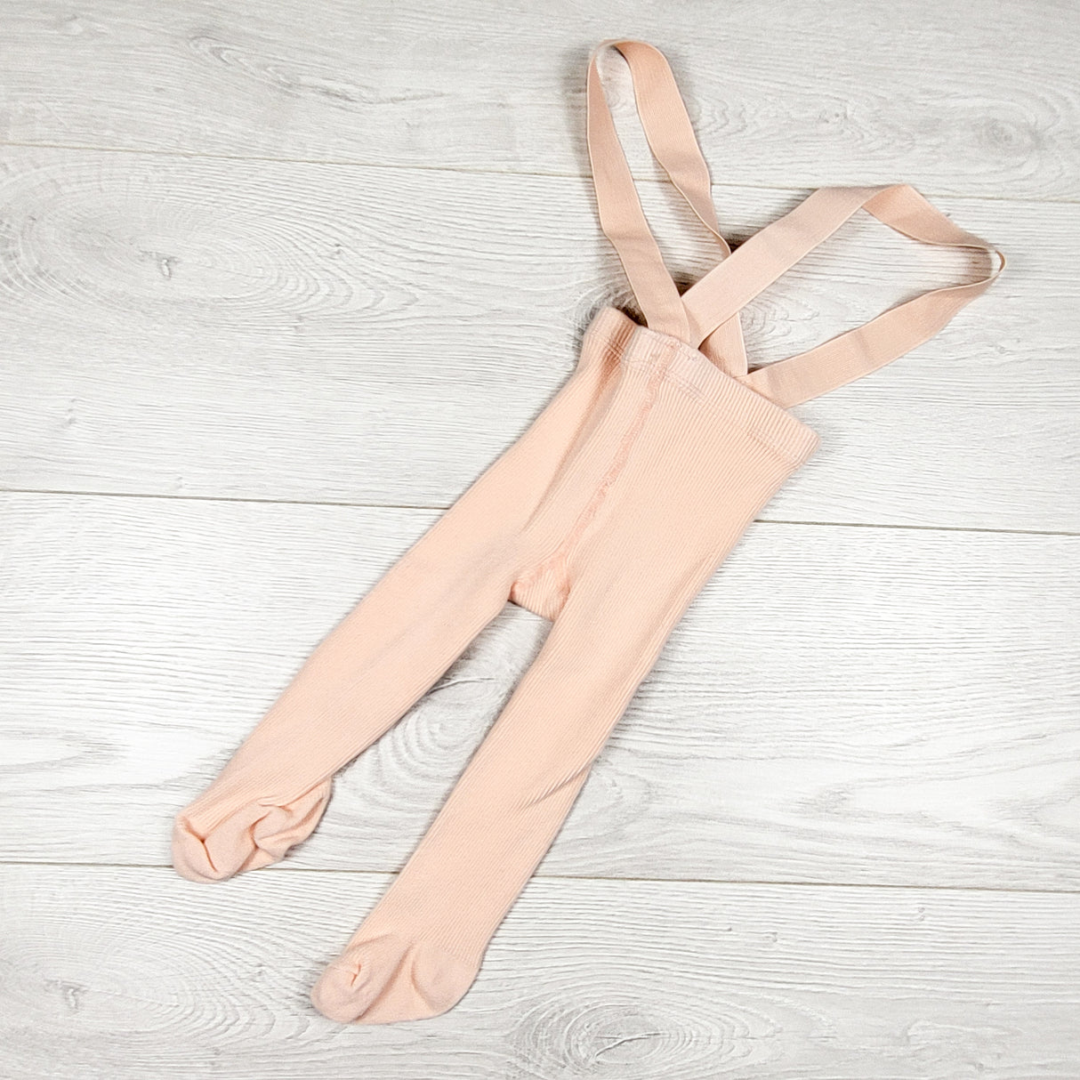 Peachy-pink suspender tights.  Approx 6 months