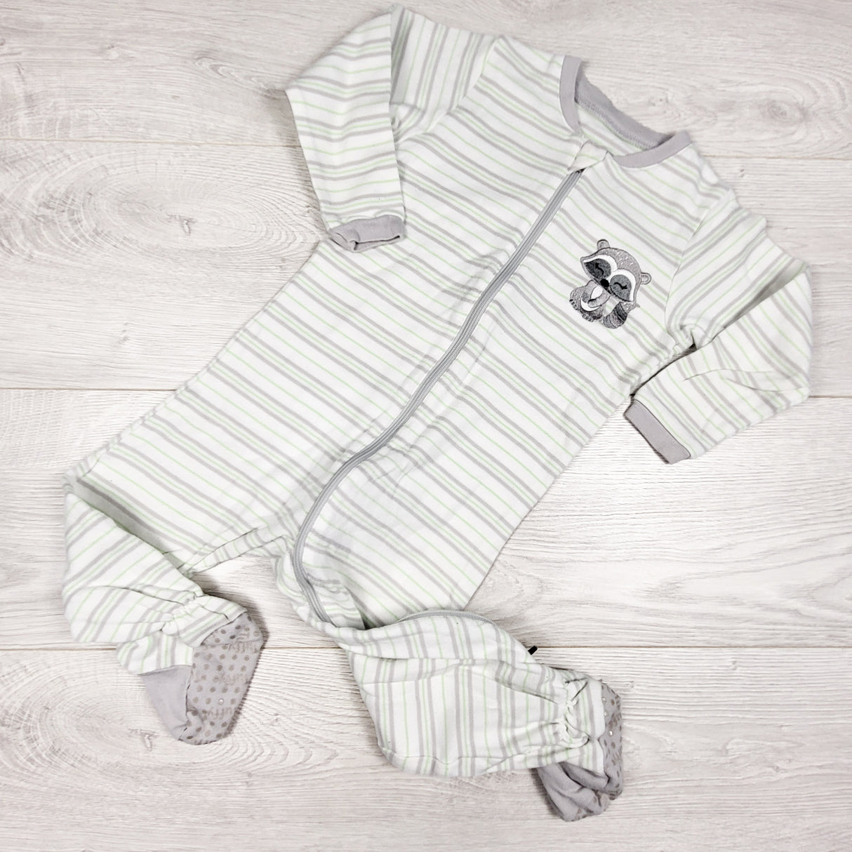 Tuffy white zippered sleeper with racoon. Size 18 months
