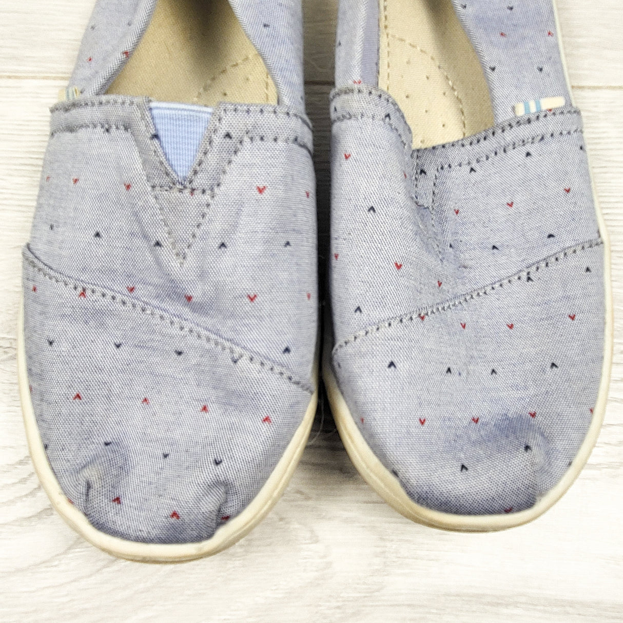 Toms blue patterned slip-on shoes. Youth size 1