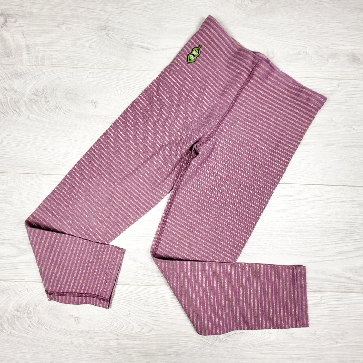 Peekaboo Beans pink and gold striped leggings. Size 3T