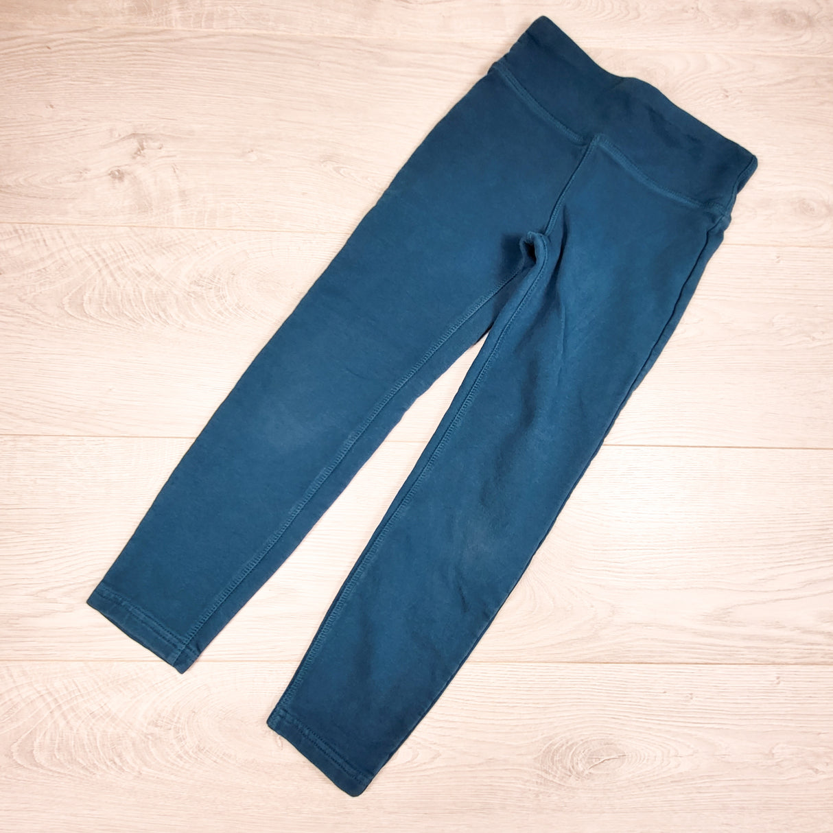 Peekaboo Beans teal leggings. Size 7