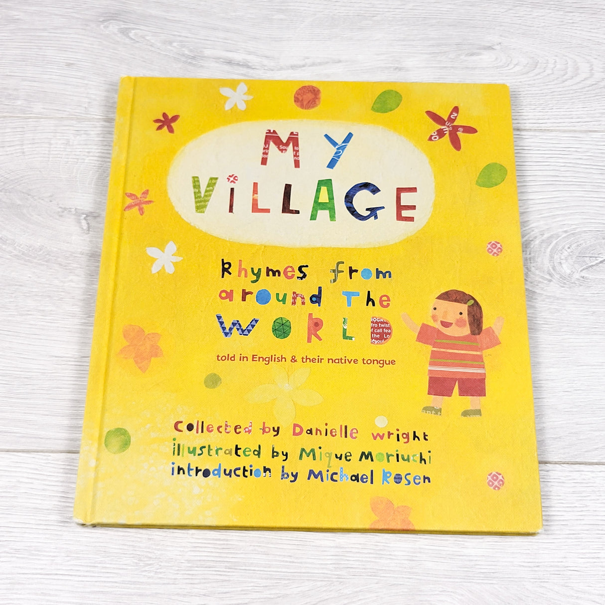 My Village: Rhymes From Around the World. Hardcover book