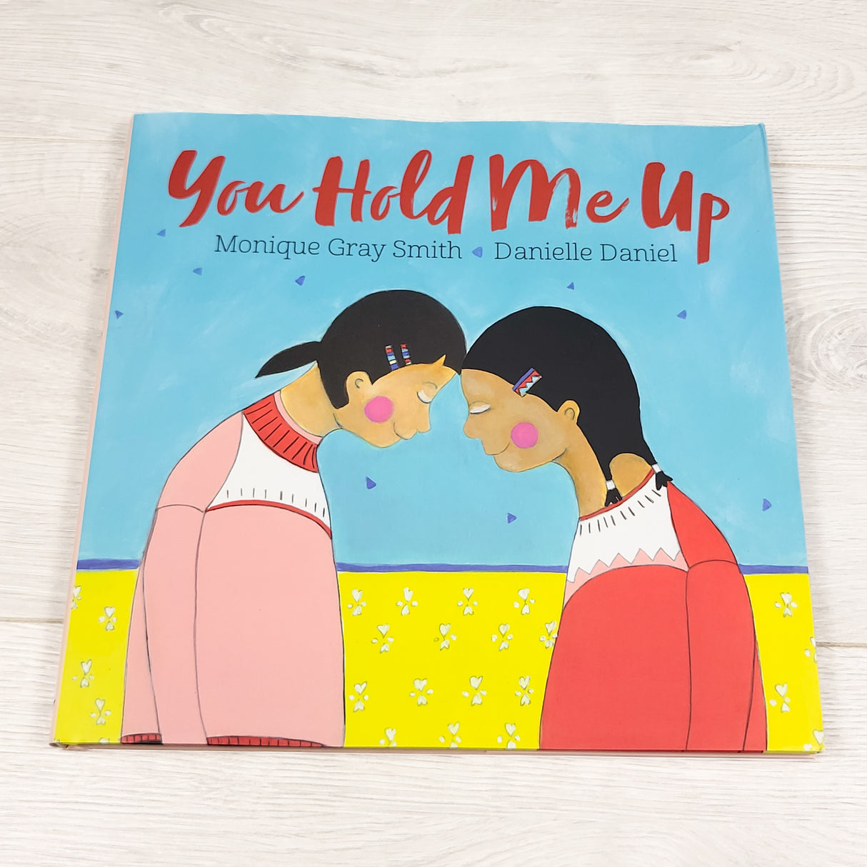 You Hold Me Up. Hardcover book