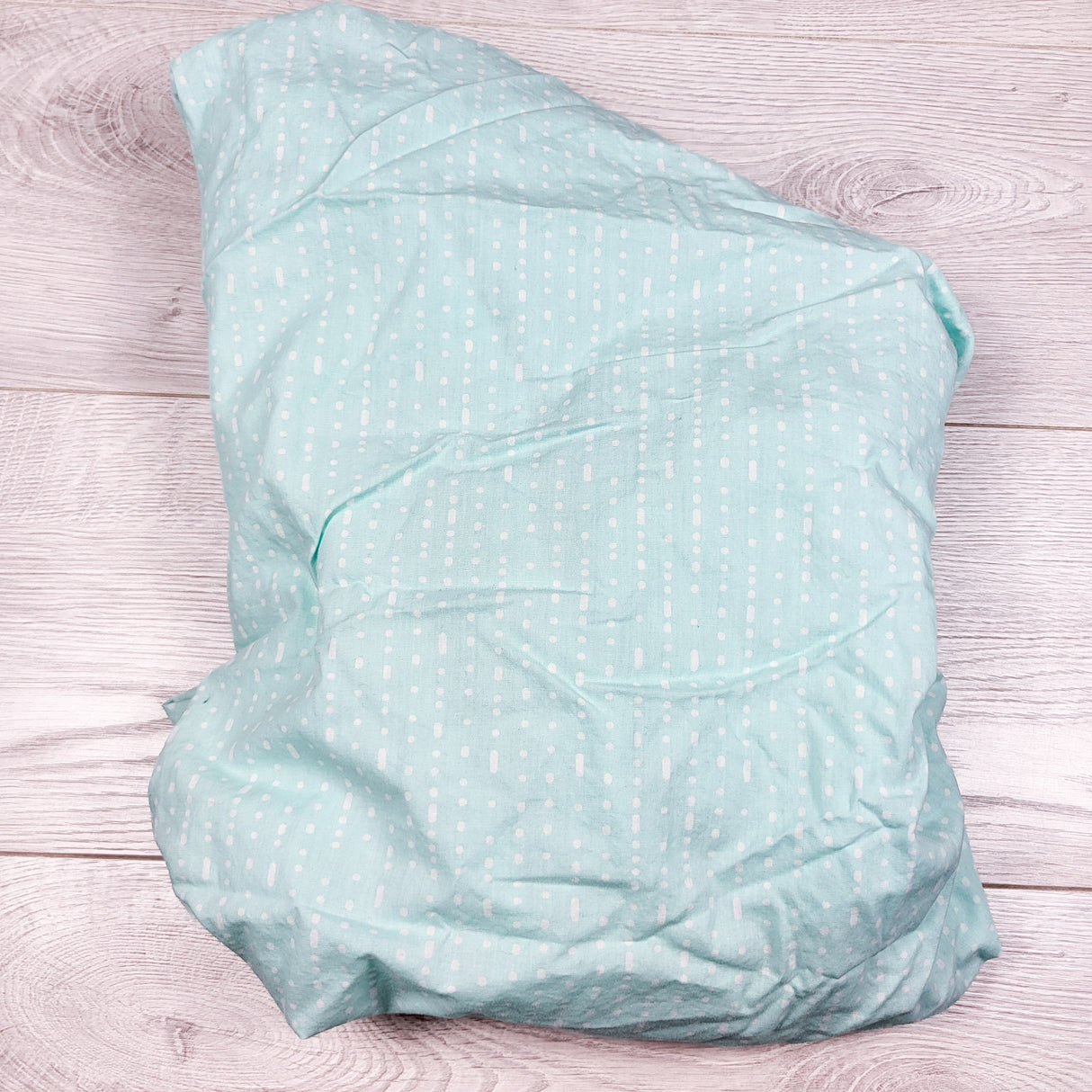 Lolli mint coloured dotted fitted crib sheet
