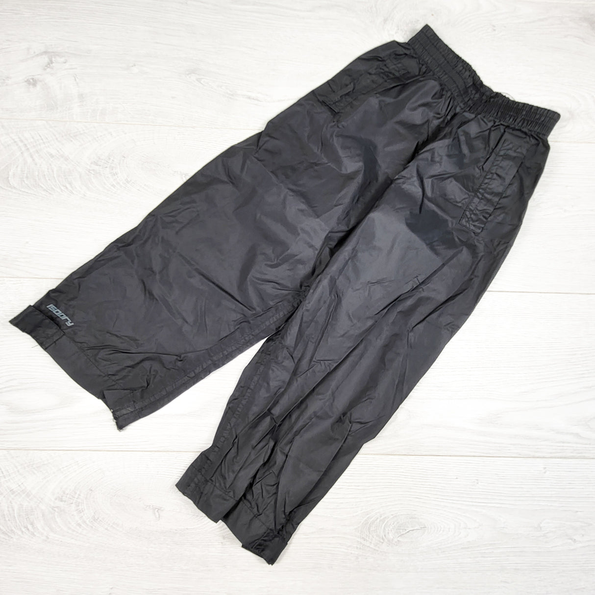 Mountain Warehouse black rain pants. Size 3/4T