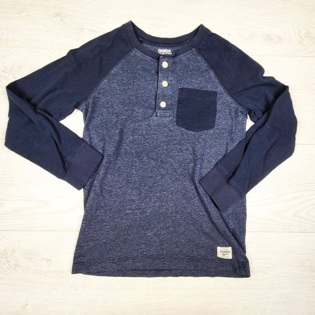 Oshkosh blue and navy long sleeved pocket tee. Size 10