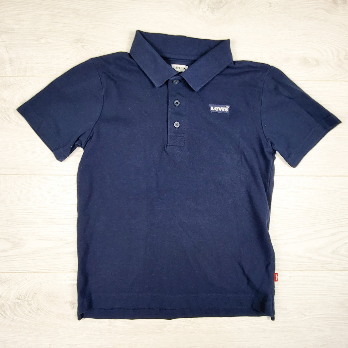 Levi's navy polo shirt. Size 10/12
