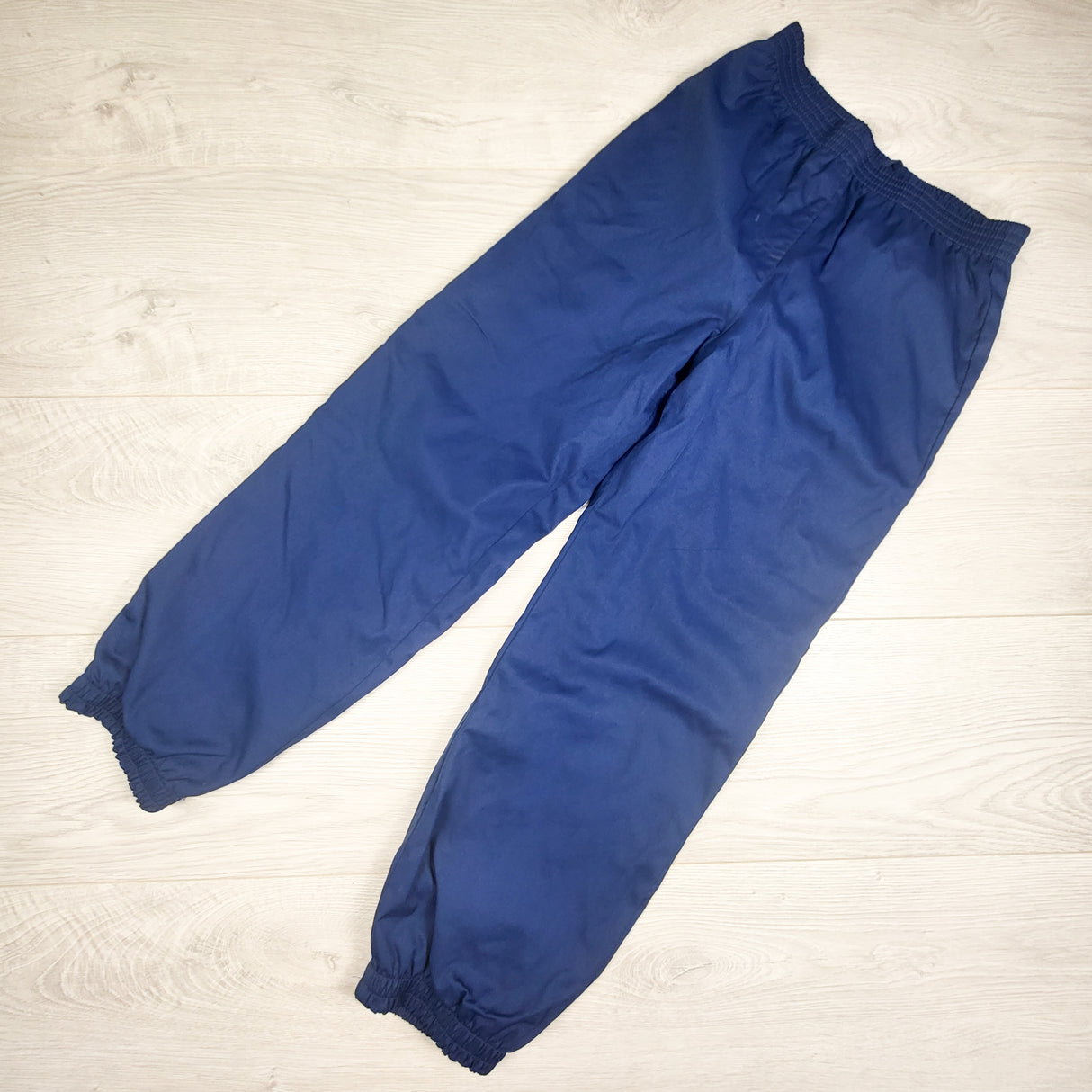 Navy jersey lined rain pants. Size 5/6