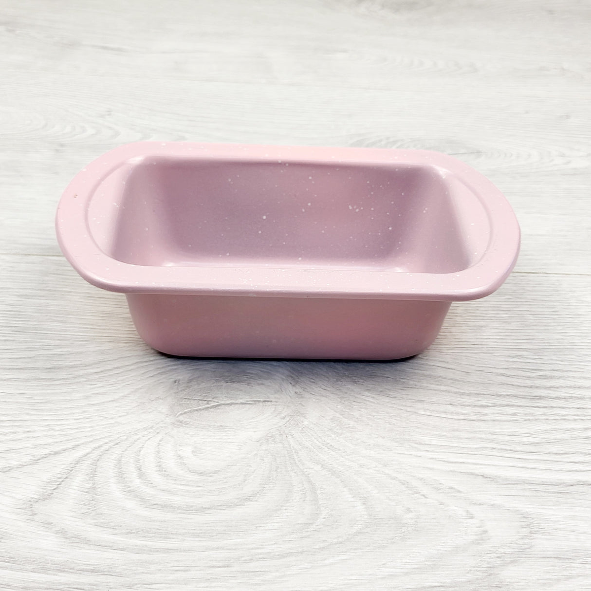 Pink speckled mini loaf pan (possibly Lovevery)