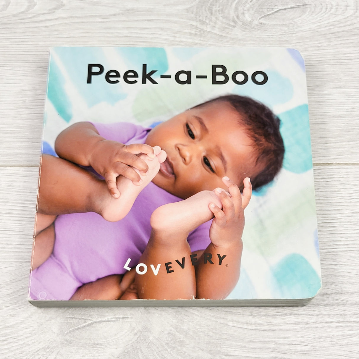 Peek-a-Boo. Lovevery board book