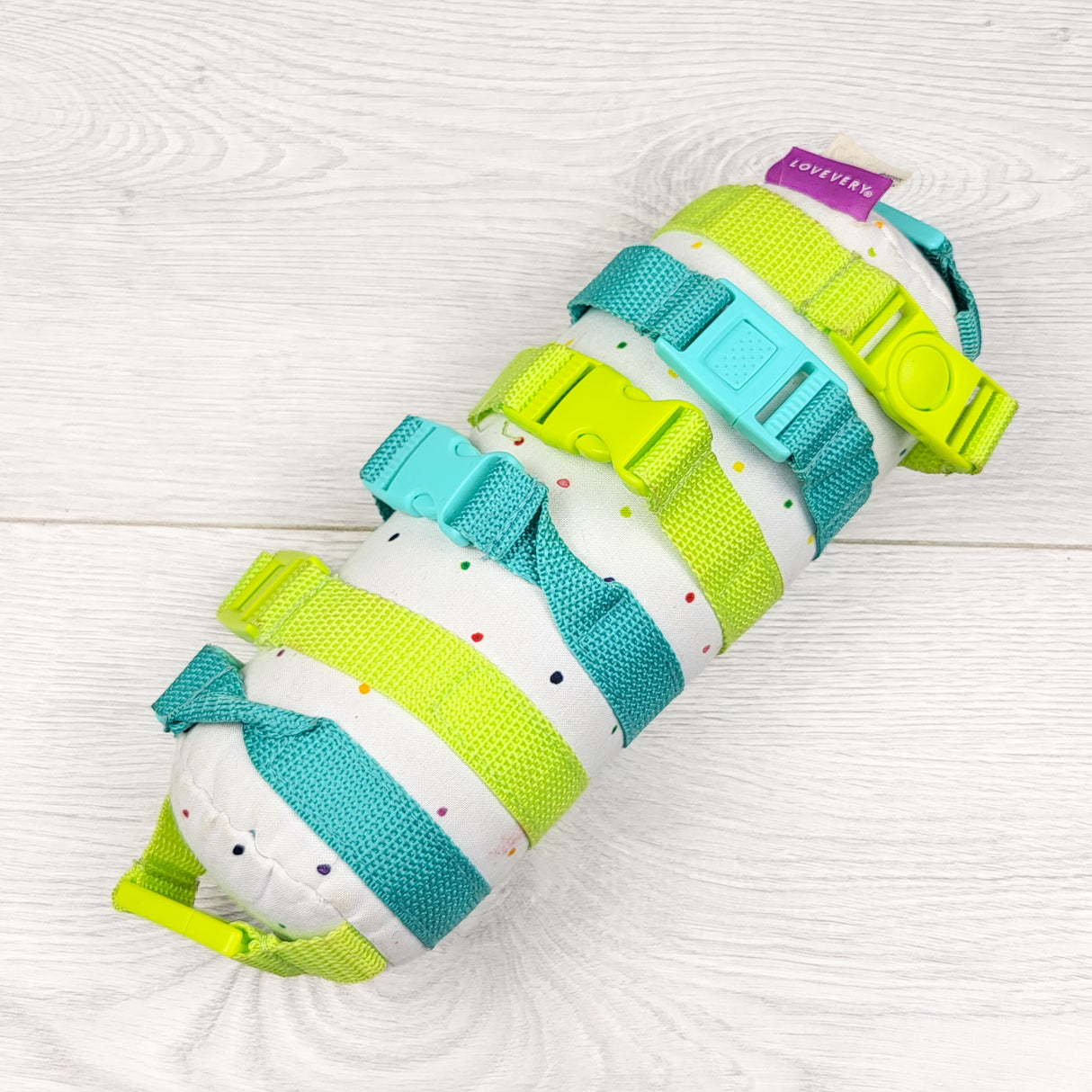 Lovevery Buckle Barrel toy