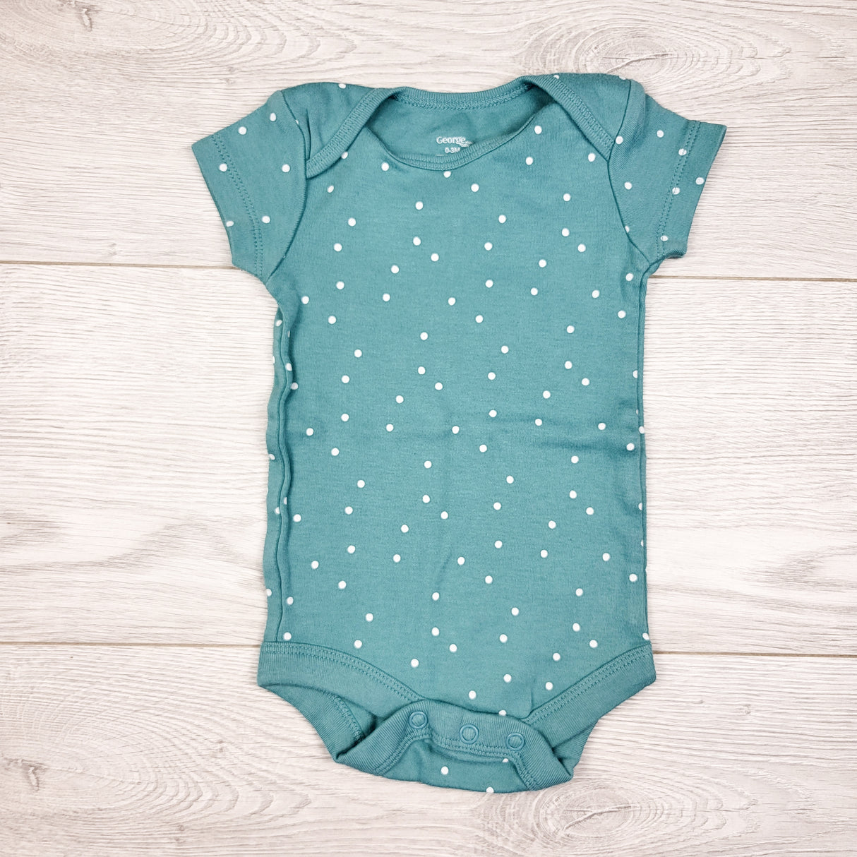 George teal polka dot bodysuit. Size 0-3 months
