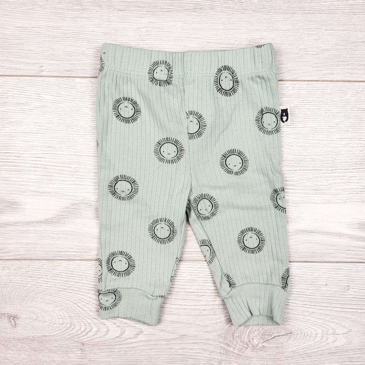 Rabbit + Bear green ribbed pants with suns. Size 0-3 months