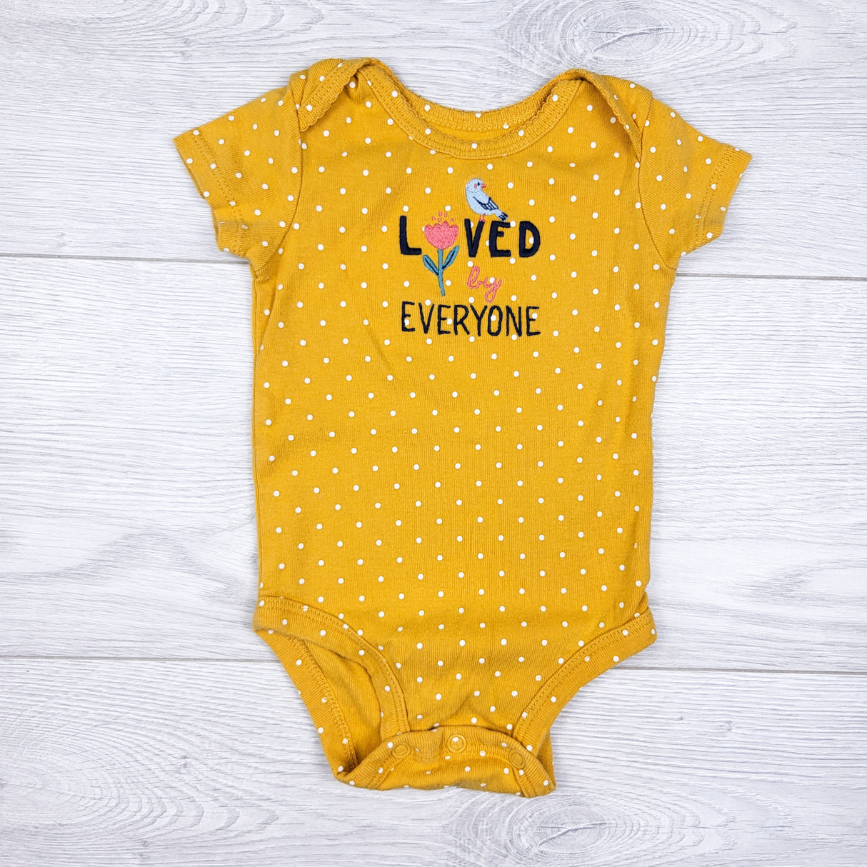 Carters yellow polka dot "Loved By Everyone" bodysuit. Size 3 months