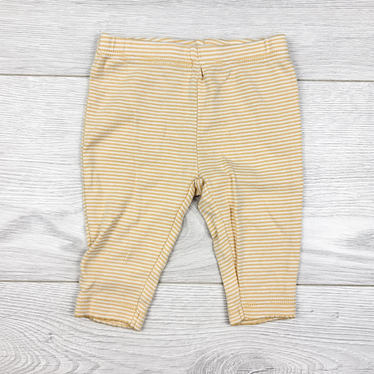 Carters yellow striped leggings. Size 3 months