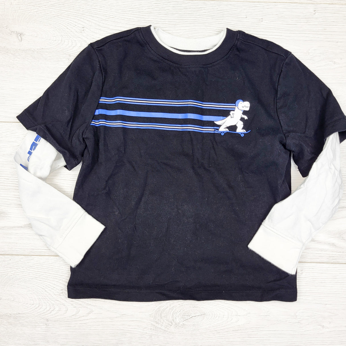 Old Navy navy and white fooler shirt with dinosaur. Size 4T