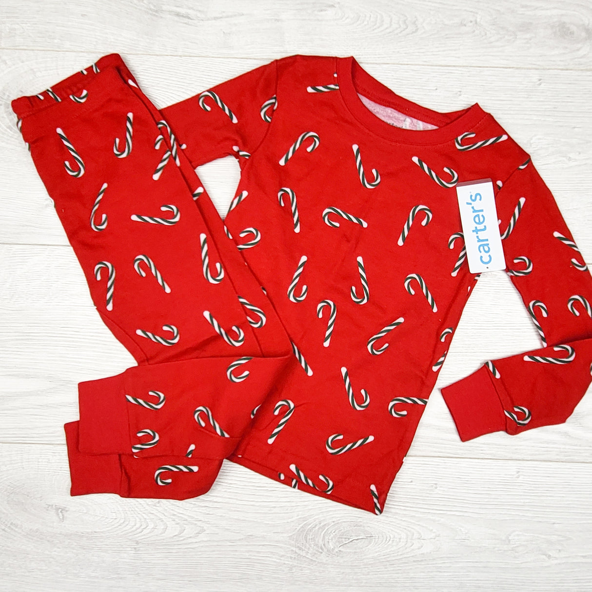 NEW - Carters 2pc candy cane PJs. Size 3T