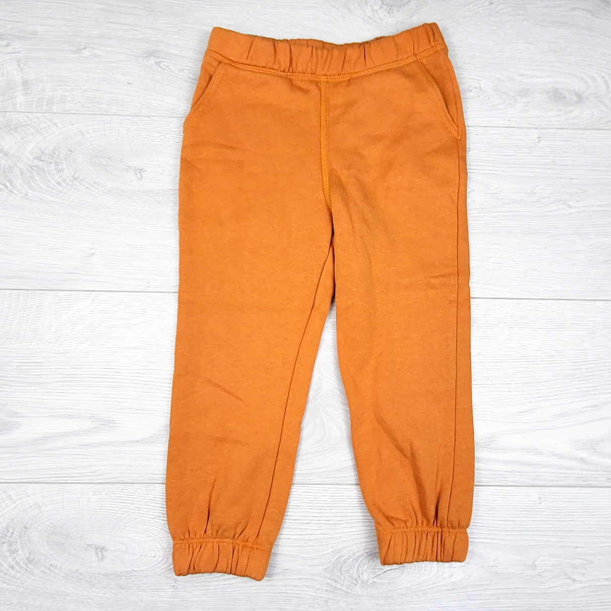 UKids orange fleecy lined joggers. Size 4T
