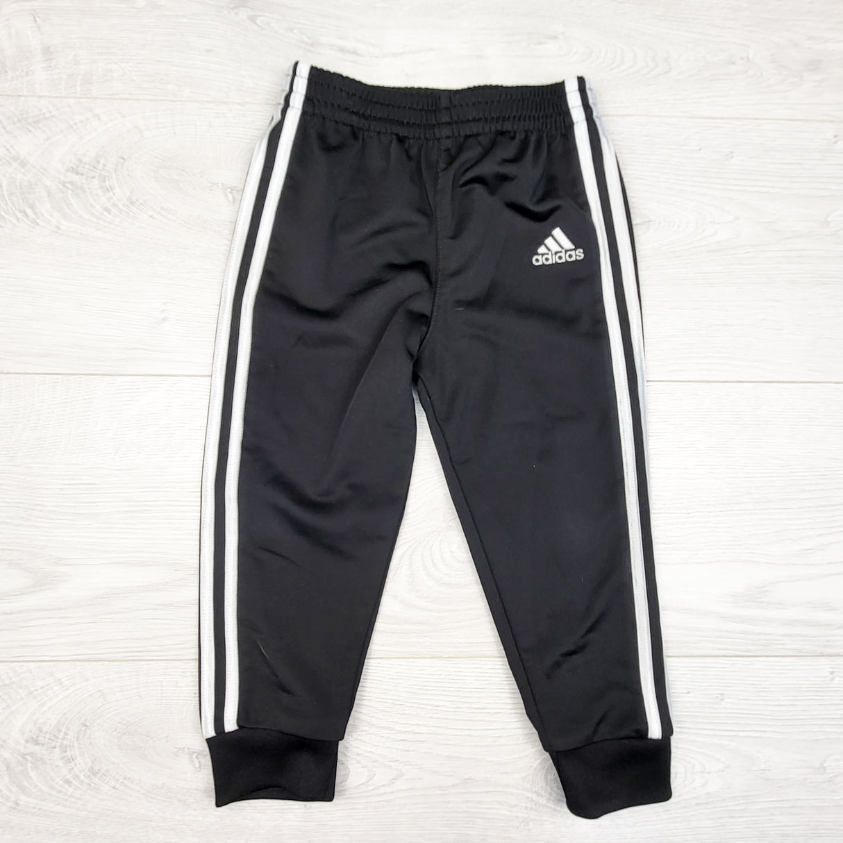 Adidas black track pants. Size 24 months