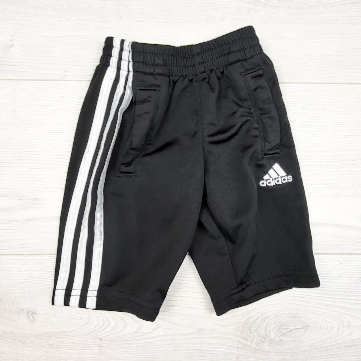 Adidas black track pants. Size 3 months