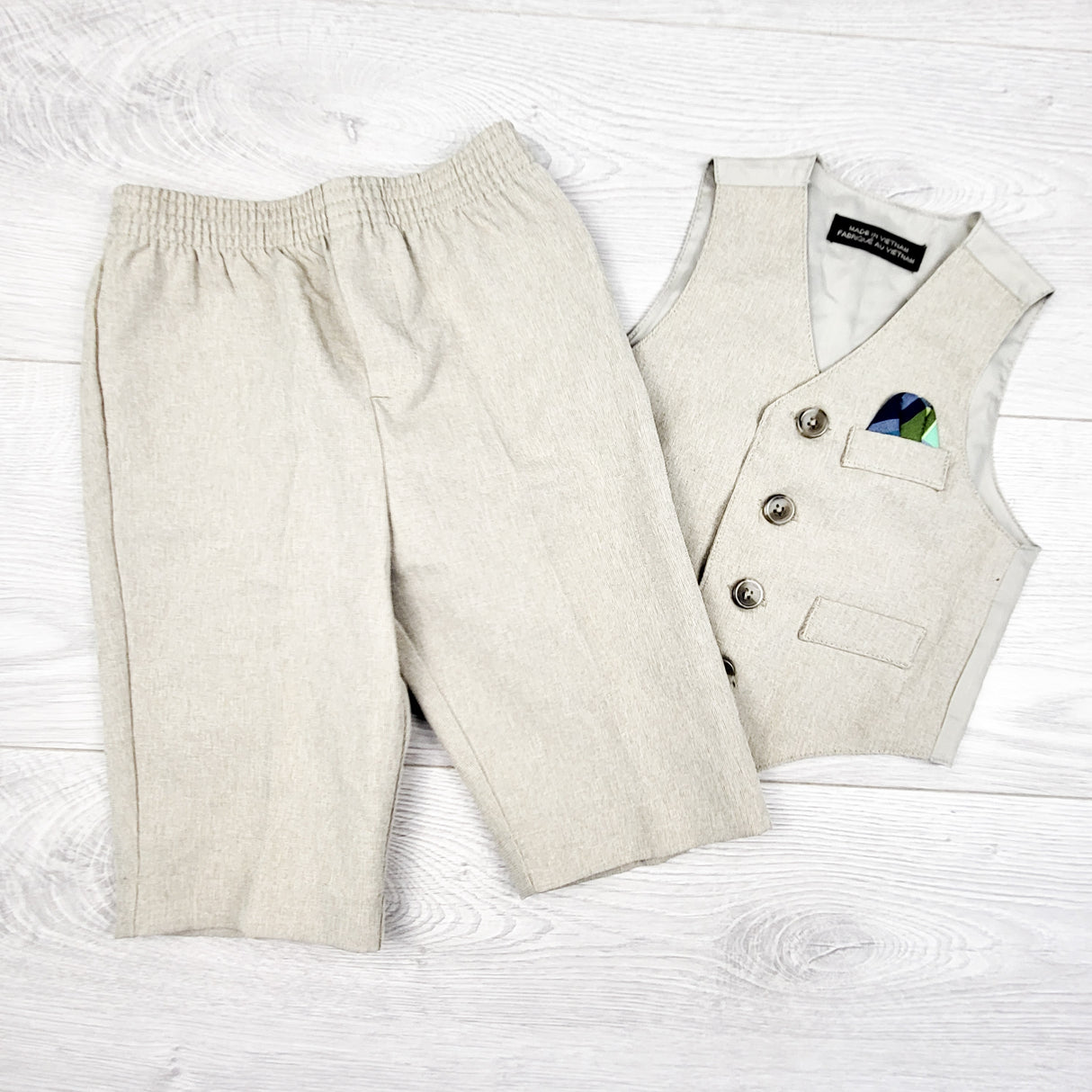 Beige suit vest and dress pants. Size 3-6 months