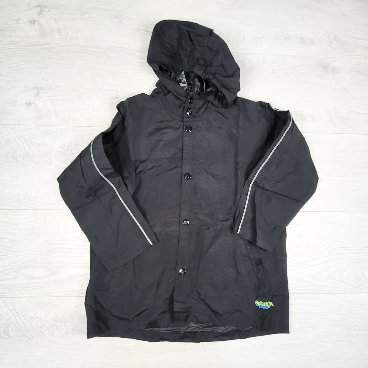 Splashly black hooded unlined rain jacket. Size 6X/7
