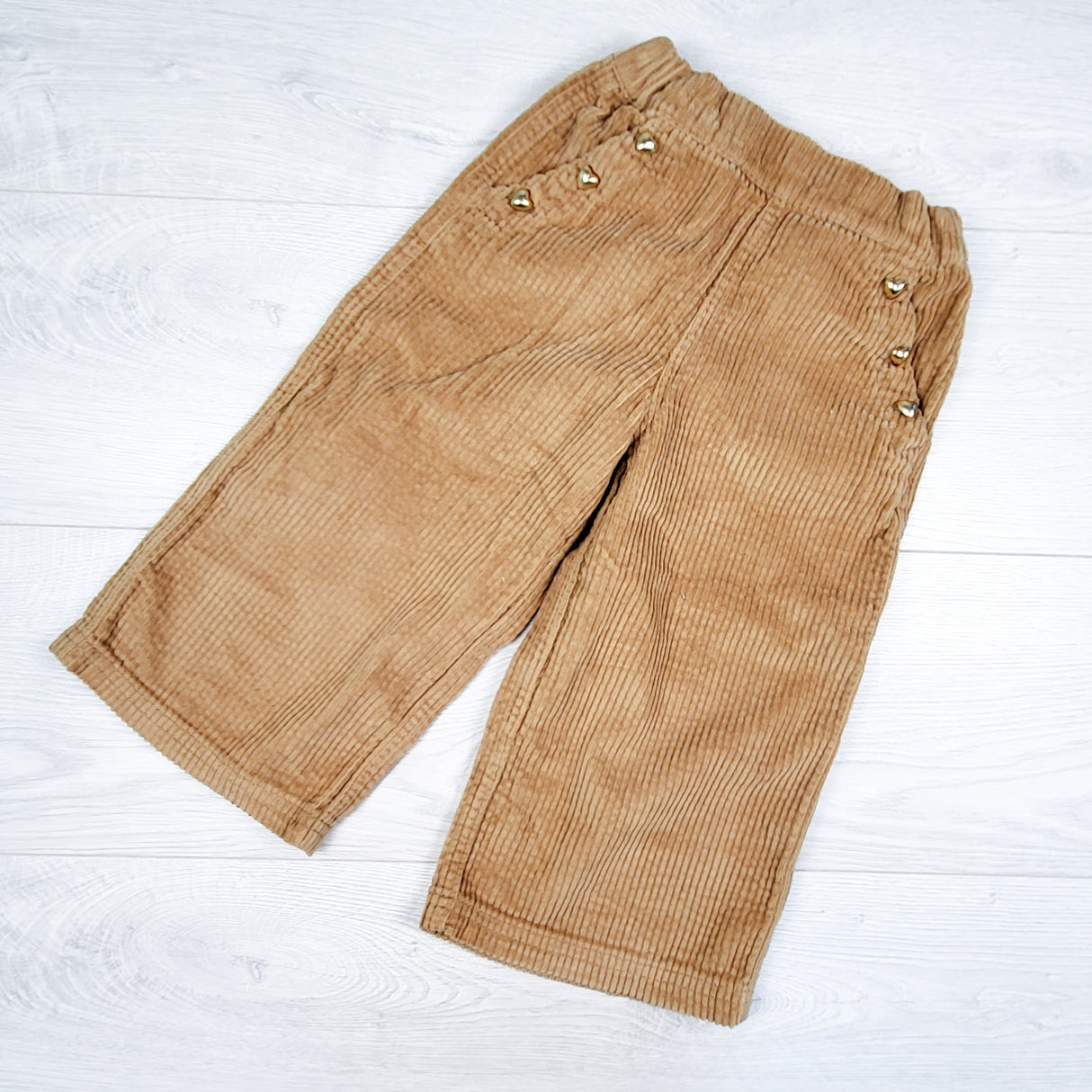 Old Navy tan wide leg corduroy pants with heart buttons. Size 2T
