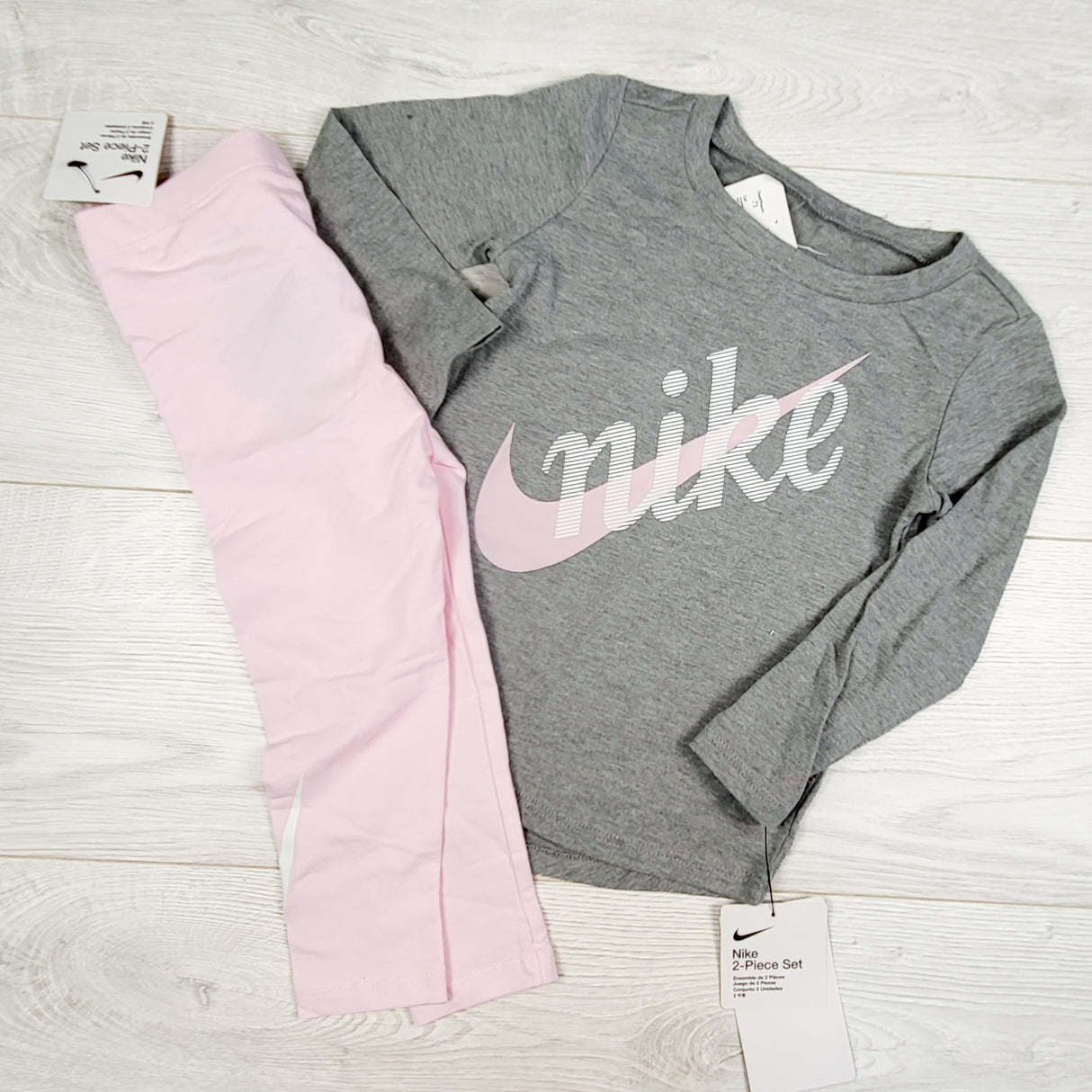 NEW - Nike pink and grey 2pc set. Size 24 months