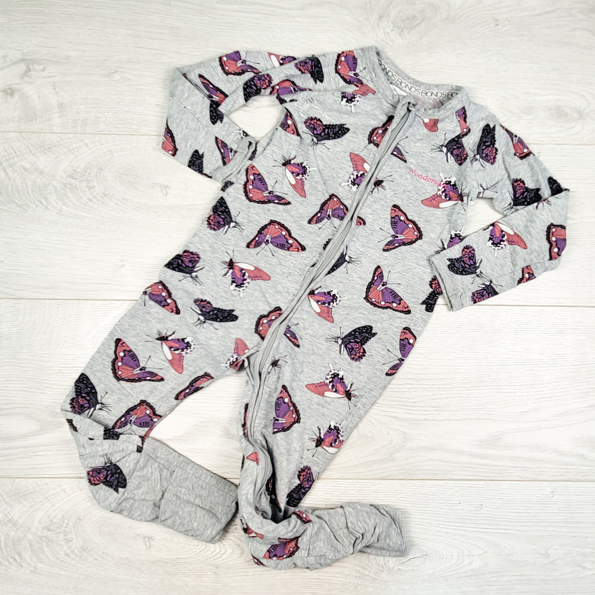 Bonds grey butterfly print wondersuit. Size 18-24 months - AS IS