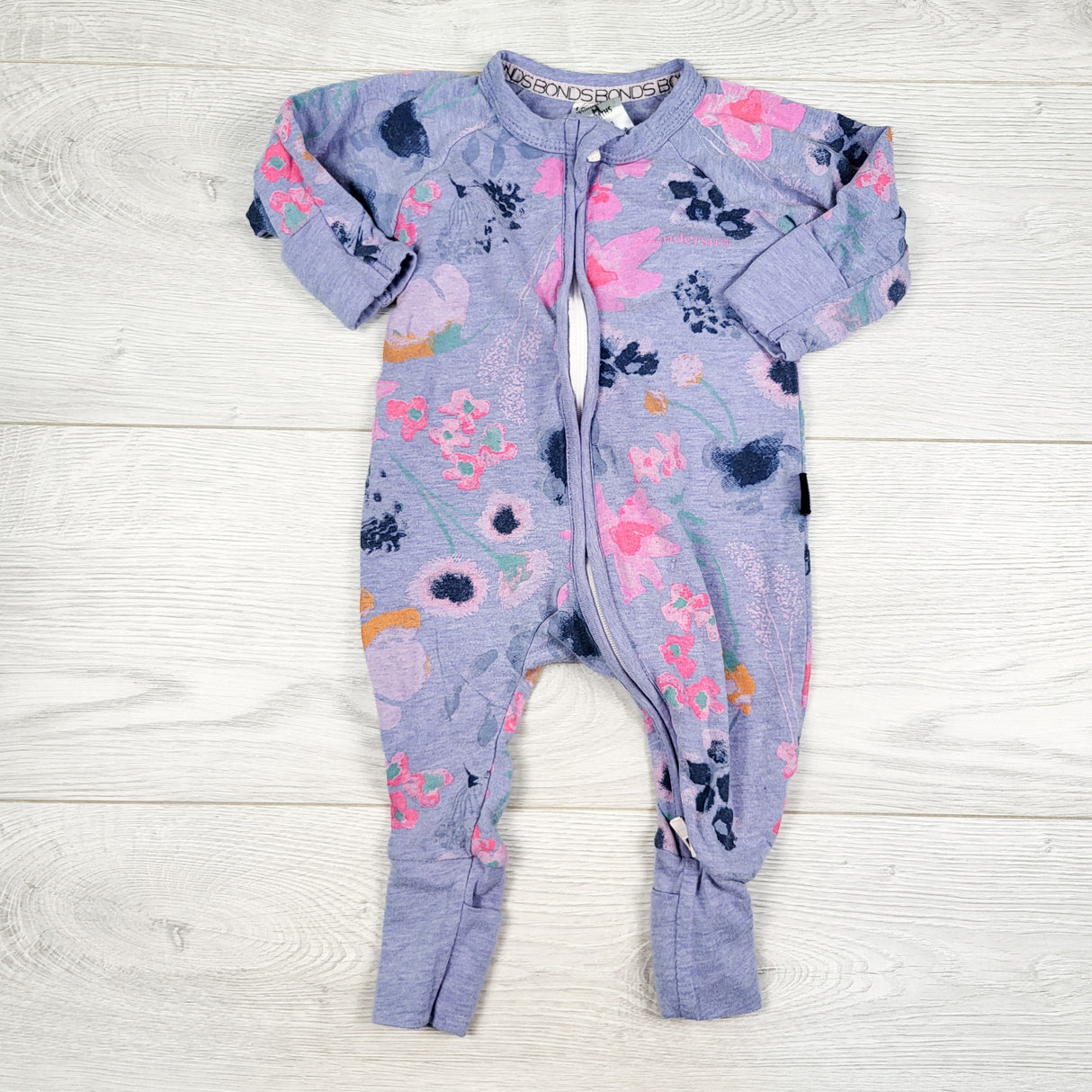 Bonds floral print zippered wondersuit. Size 0-3 months