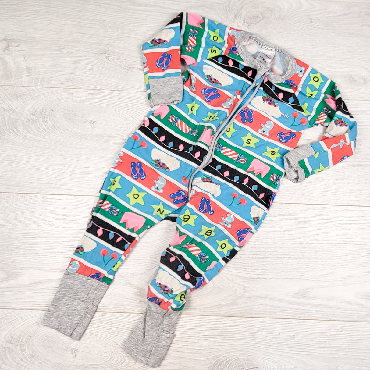 Bonds holiday patterned zippered wondersuit. Size 6-12 months
