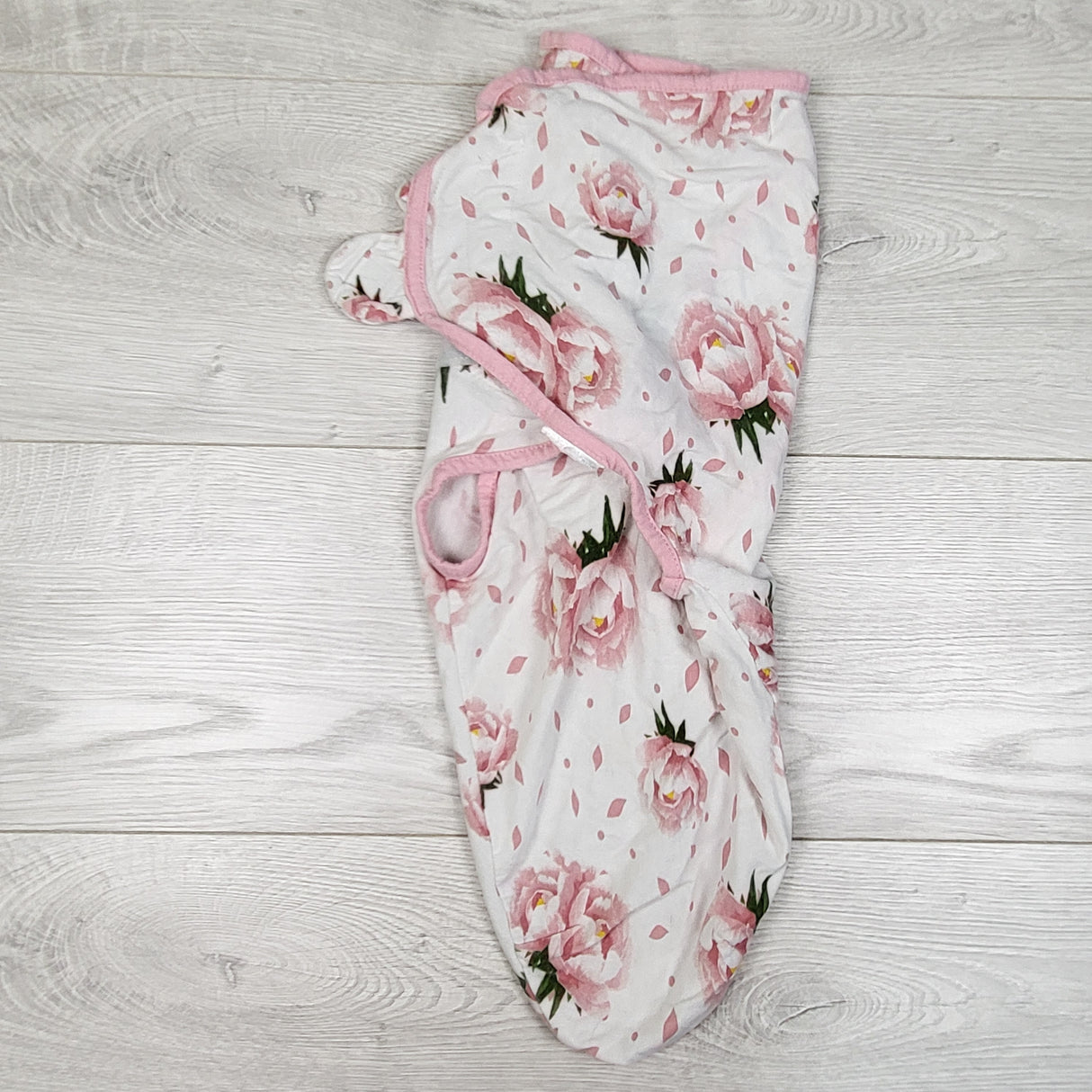 White and pink floral print swaddle