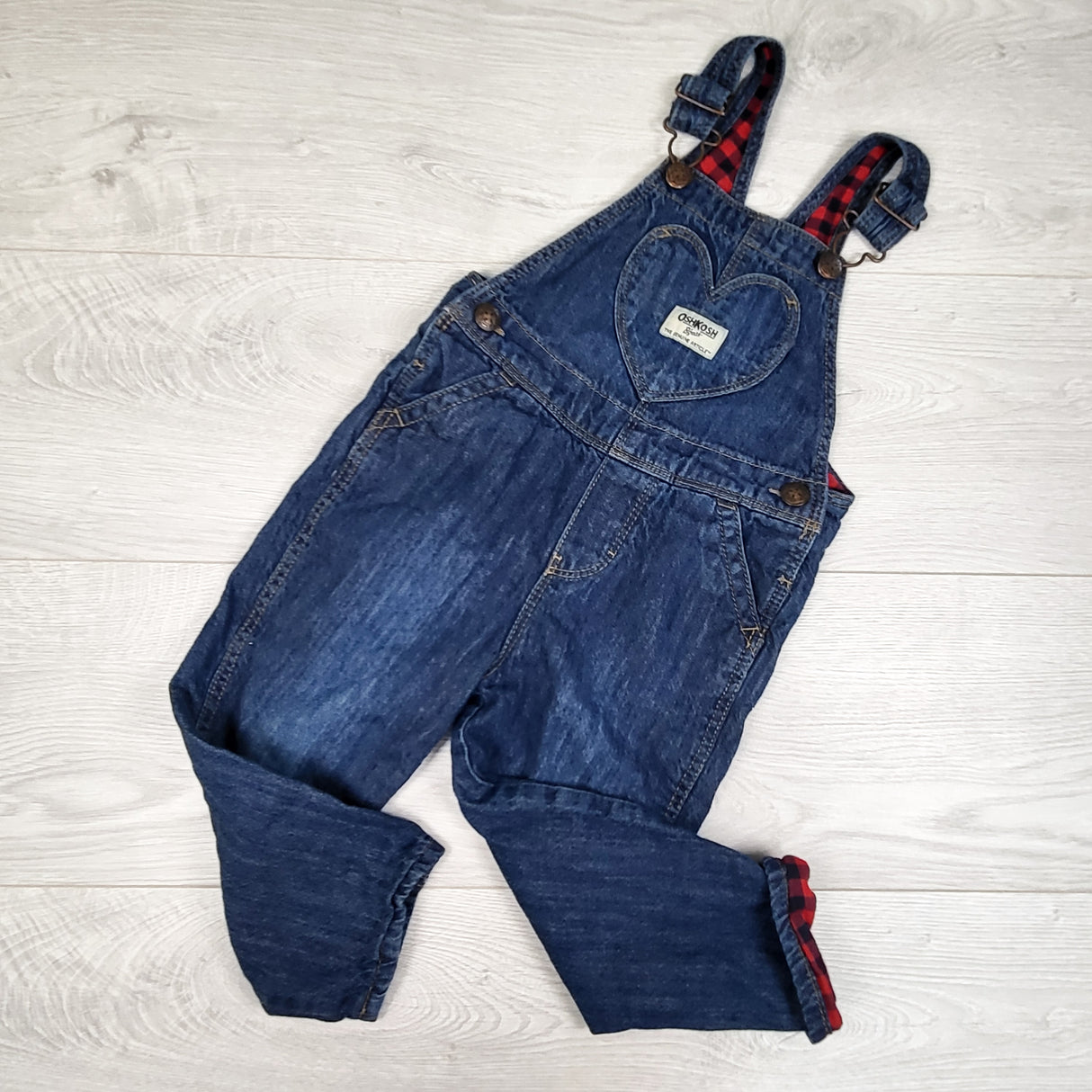 Oshkosh jersey lined denim overalls with heart pocket. Size 2T