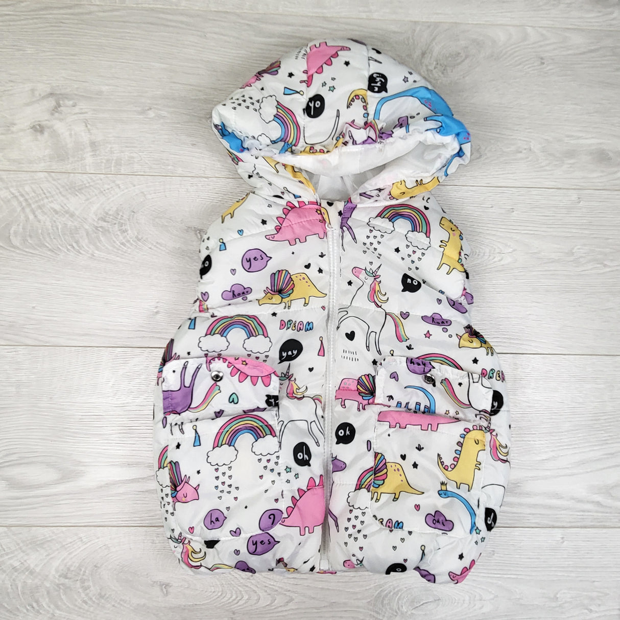 Mud Kingdom white hooded puffer vest with dinosaurs and unicorns. Size 3/4T