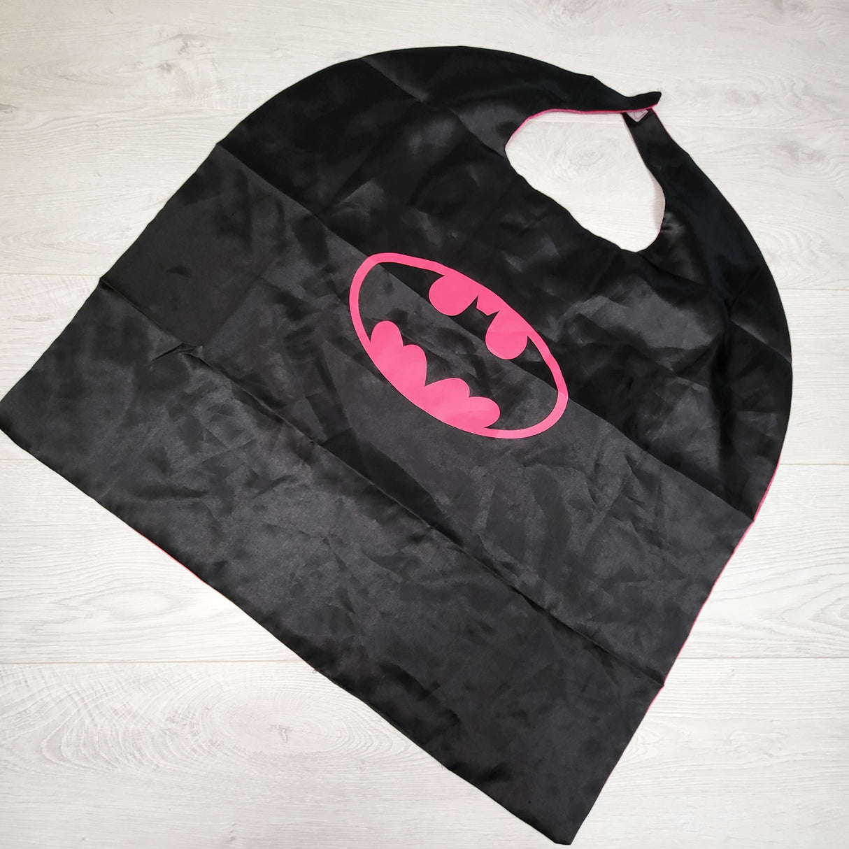 Reversible black and pink Bat Girl cape
