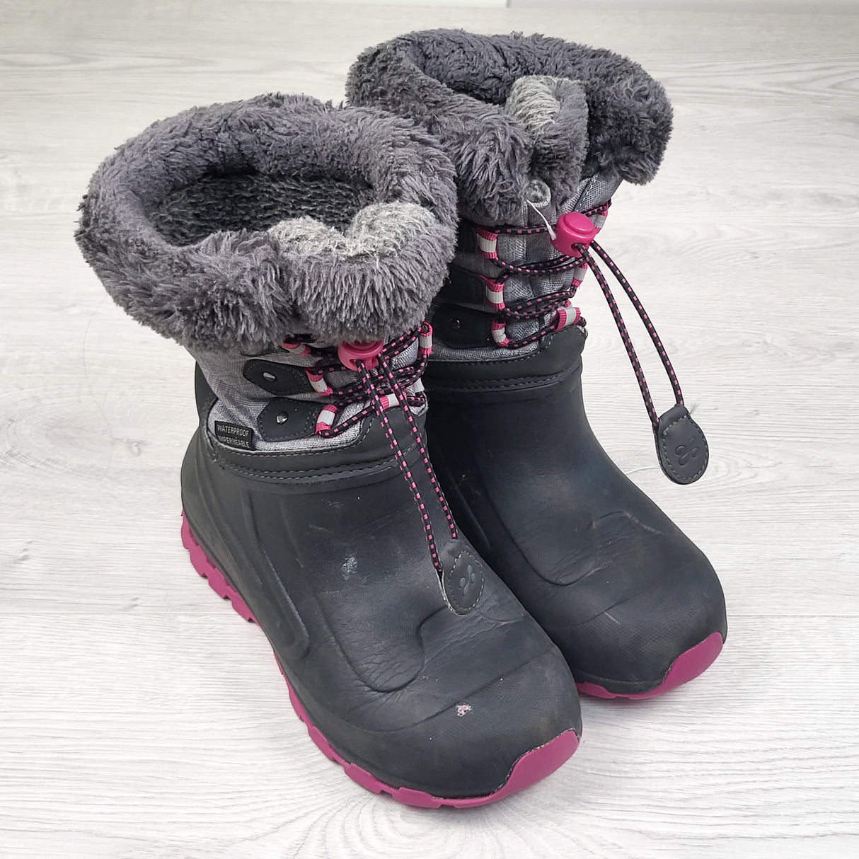 XMTN pink and grey waterproof boots. Youth size 2