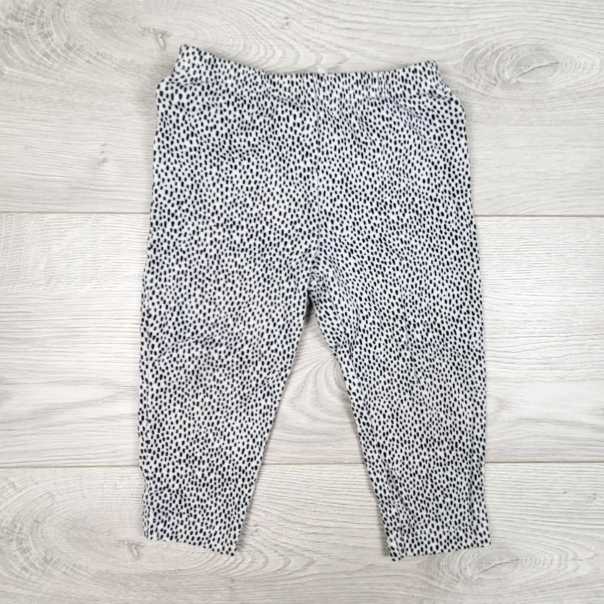 Child of Mine white and blue dot patterned leggings. Size 12 months