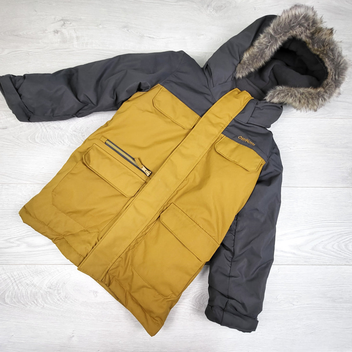 Oshkosh yellow and grey fleece lined winter coat. Size 6