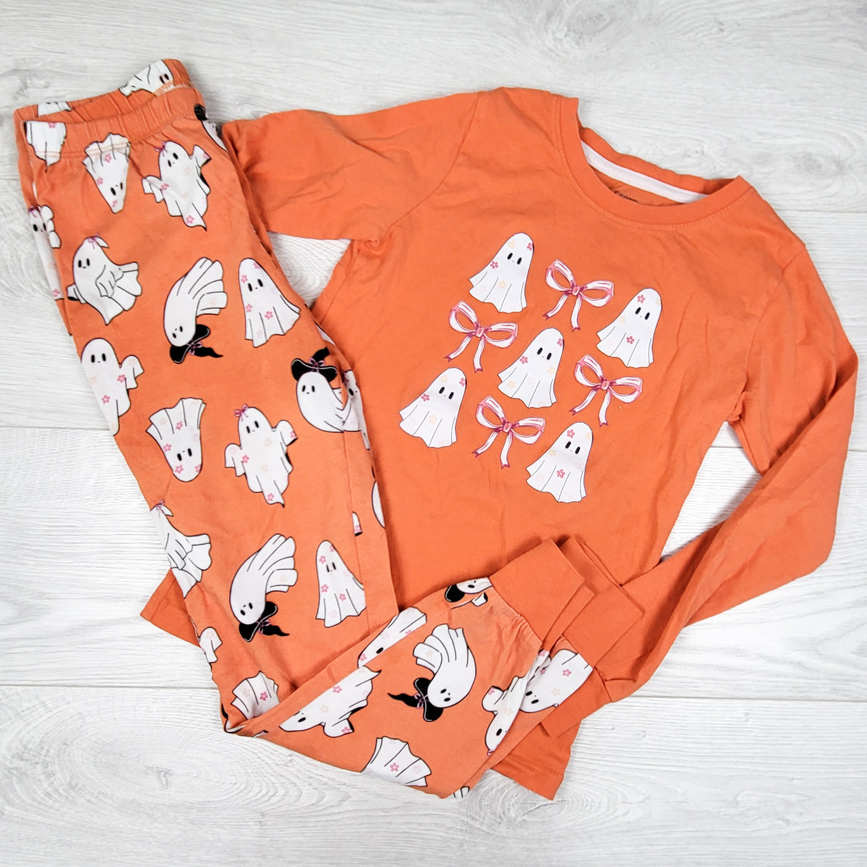 George orange 2pc PJs with ghosts. Size 7/8