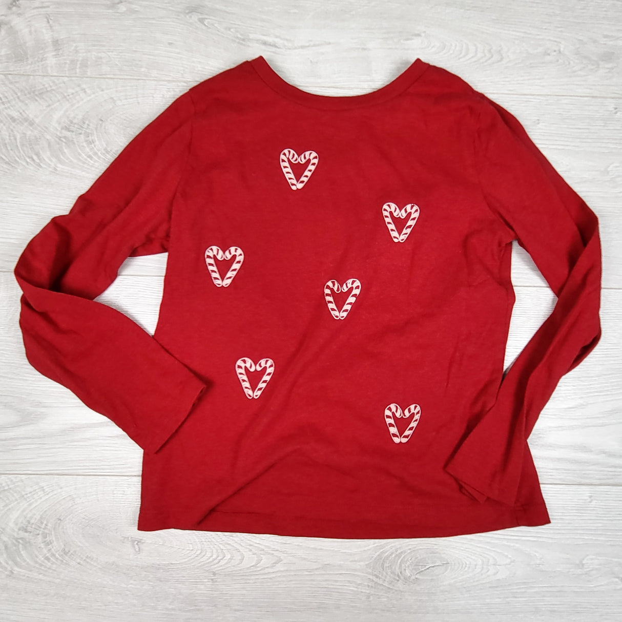 Carters red long sleeve top with candy cane hearts. Size medium (8)
