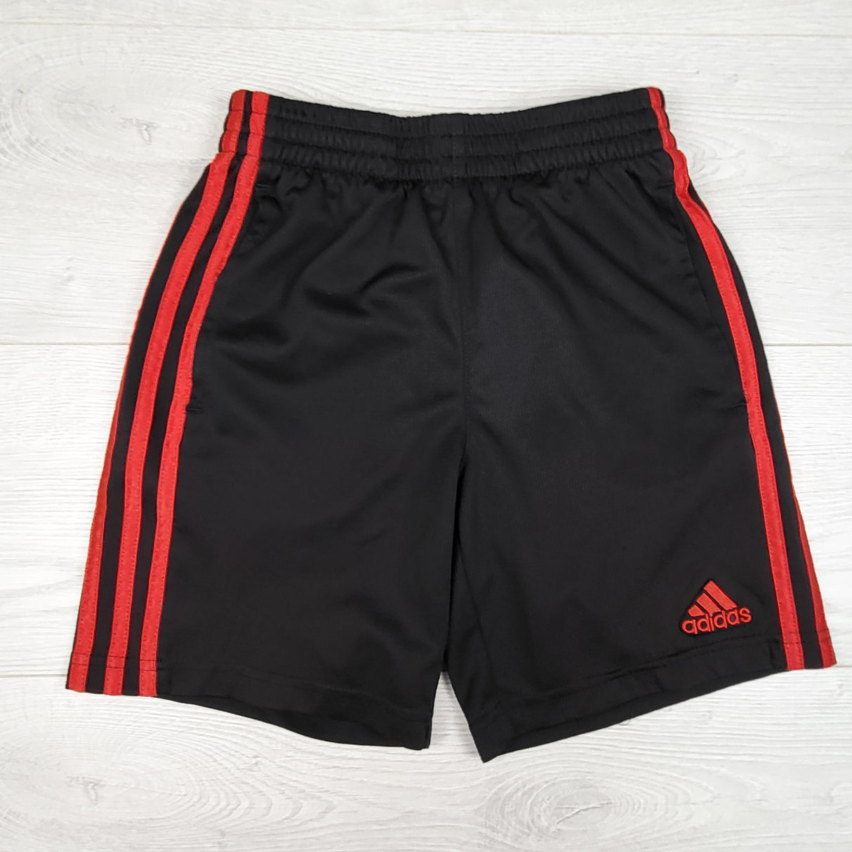 Adidas black and red active shorts. Size small (6/7ish)