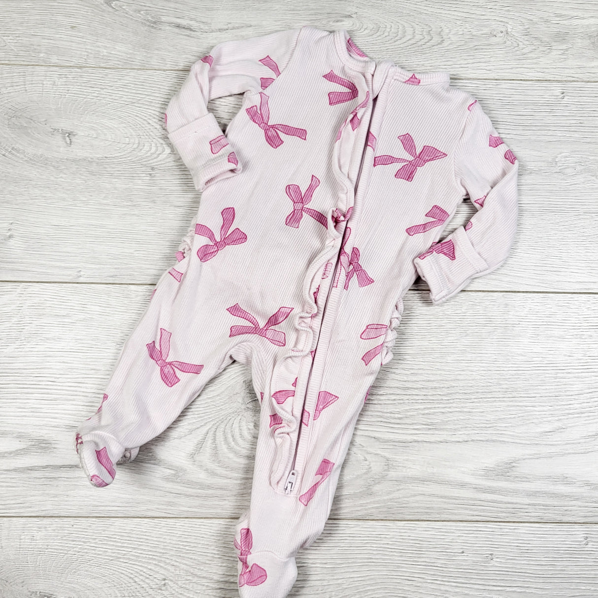 Angel Dear pink zippered soft modal fabric bow sleeper. Size 0-3 months