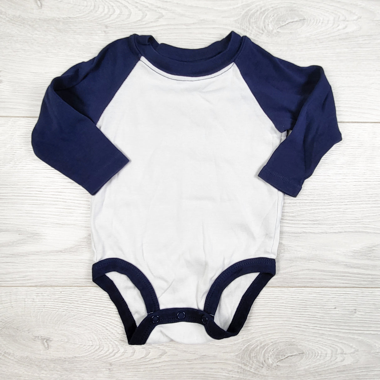 Carters navy and white raglan style bodysuit. Size 6 months