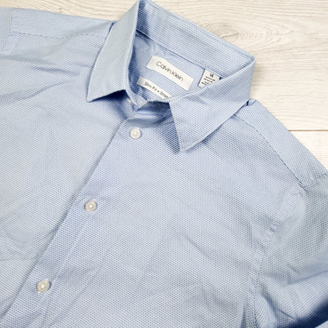 Calvin Klein blue button down dress shirt. Size 14