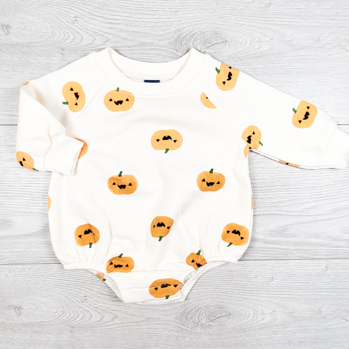 Old Navy jack-o-lantern sweatshirt romper. Size 0-3 months